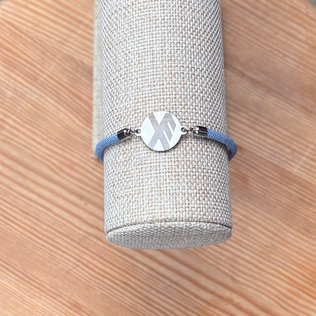 Good luck rune round 21mm silver SS textile cord light blue