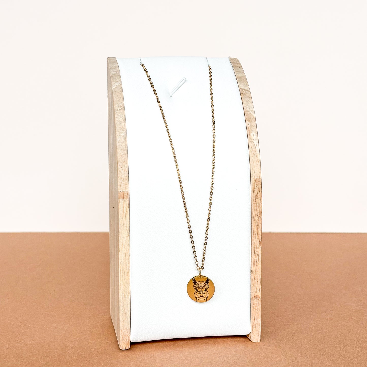 Lamas Kopfkette aus Edelstahl golden