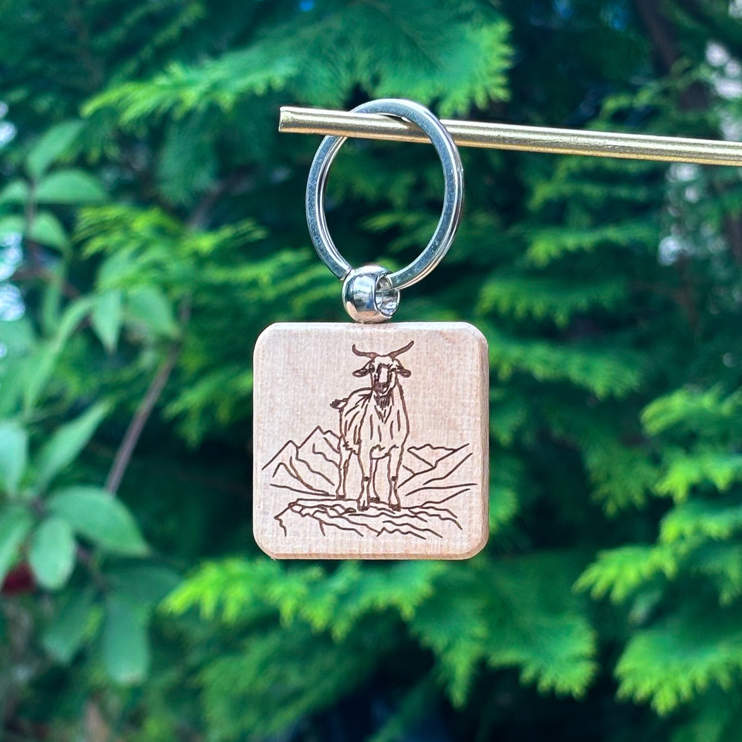 Goat standing on mountain wooden keychain 38x38mm square