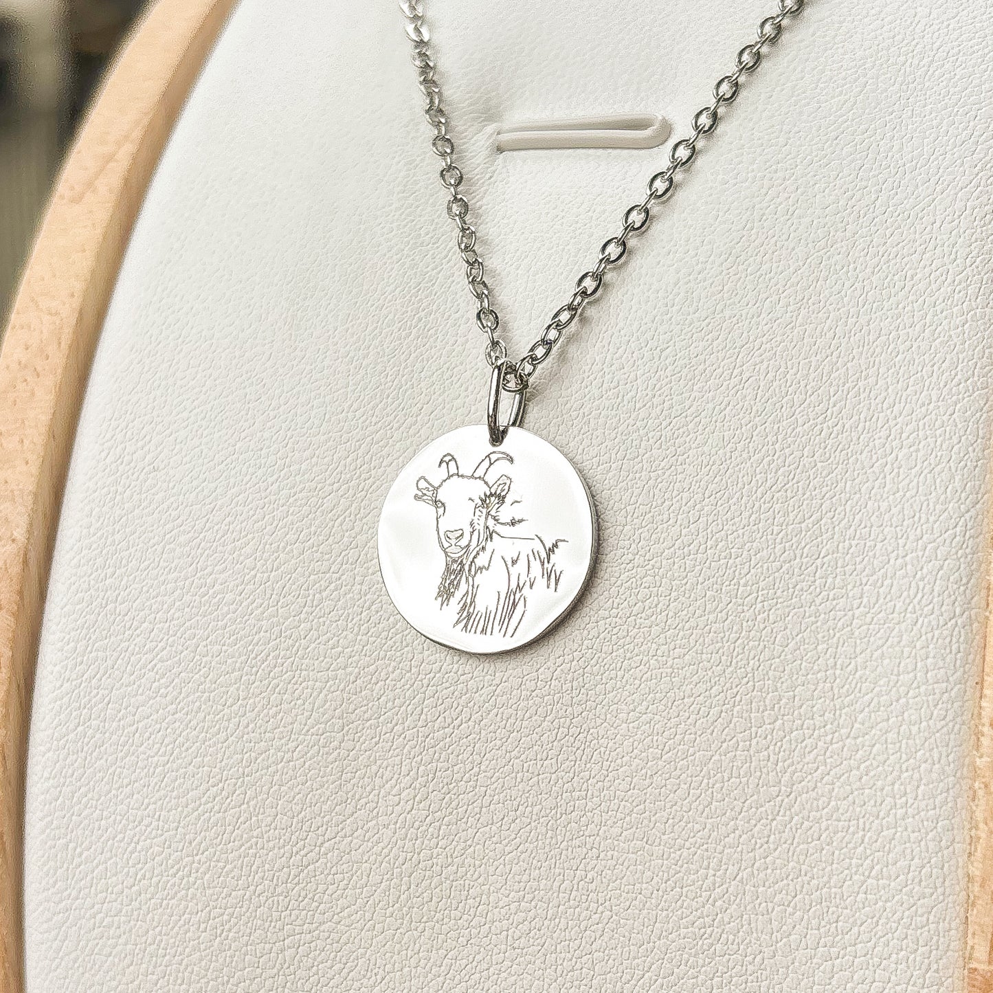 Goat head on a mountain necklace - stainless steel
