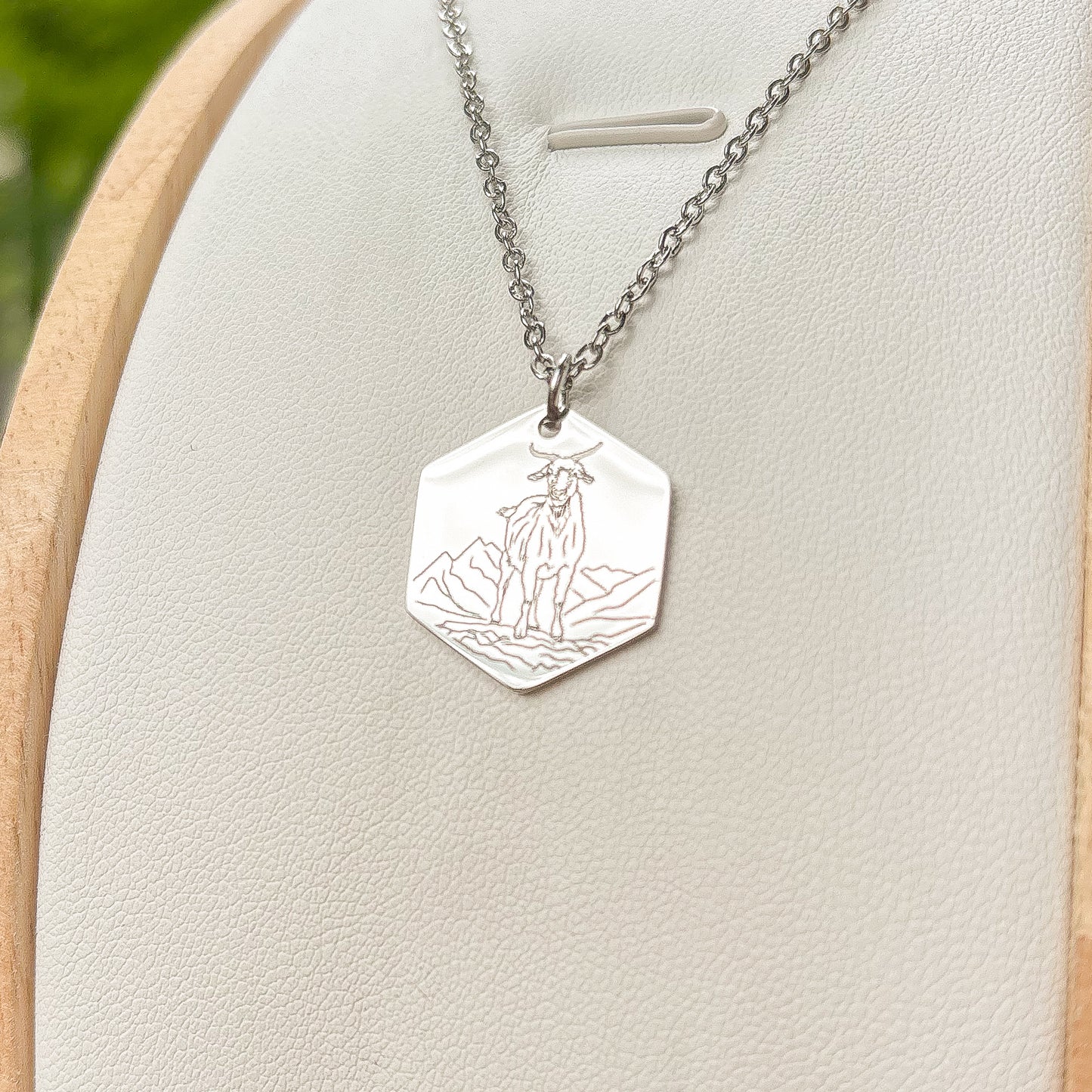 Goat on a mountain necklace - stainless steel