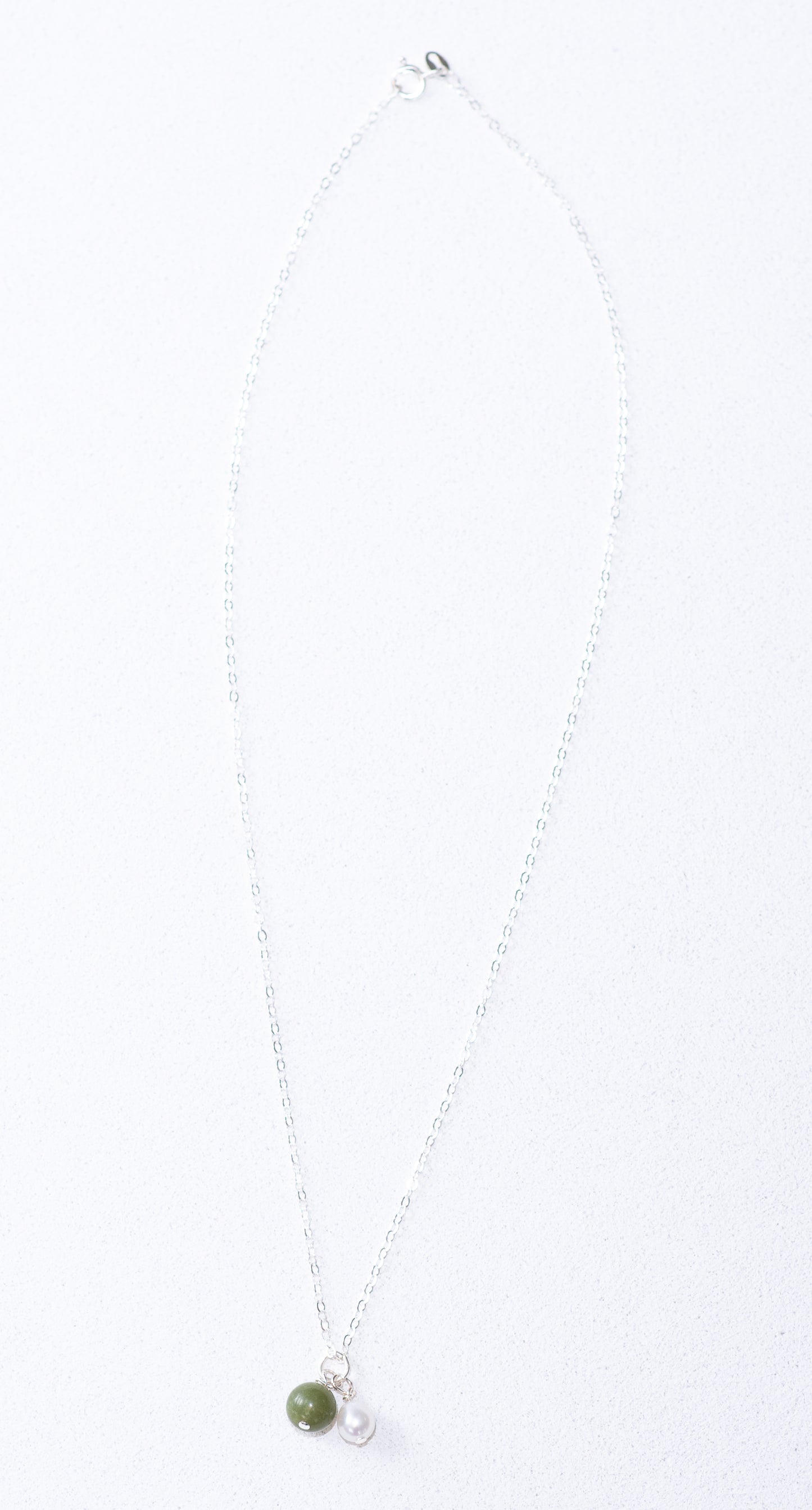 Jade stenen kraal en zoetwaterparel ketting