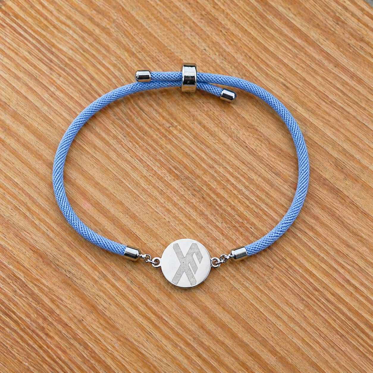 Good luck rune round 21mm silver SS textile cord light blue