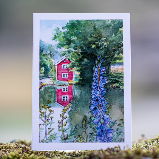 Scenery card- Little red house with pond and Monk’s hood flowers