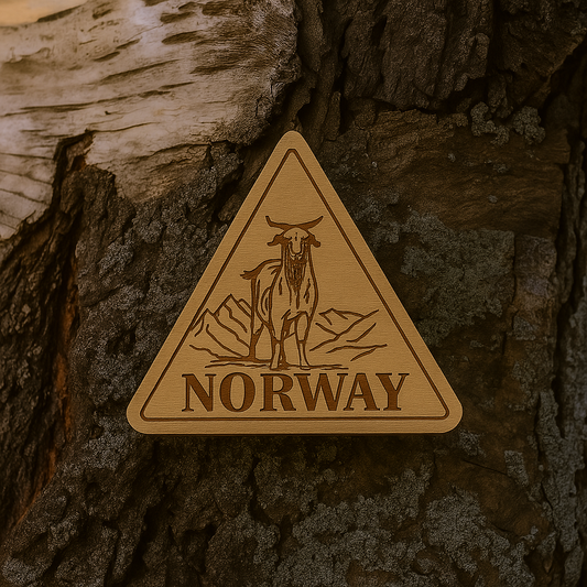 Goat standing on mountain in triangle 55x49mm magnet