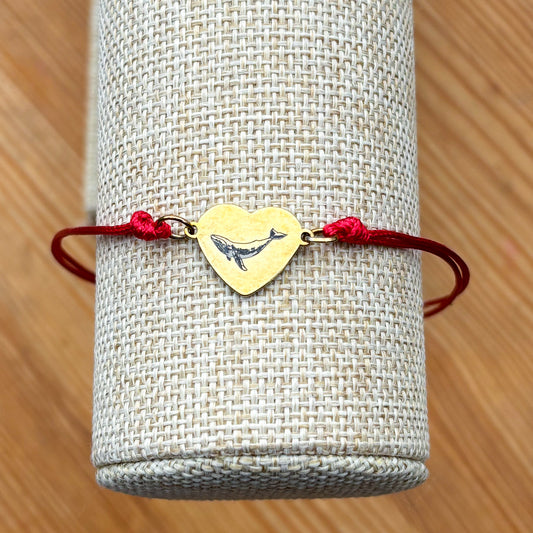 Whale on heart 14x12mm golden on thin cord red