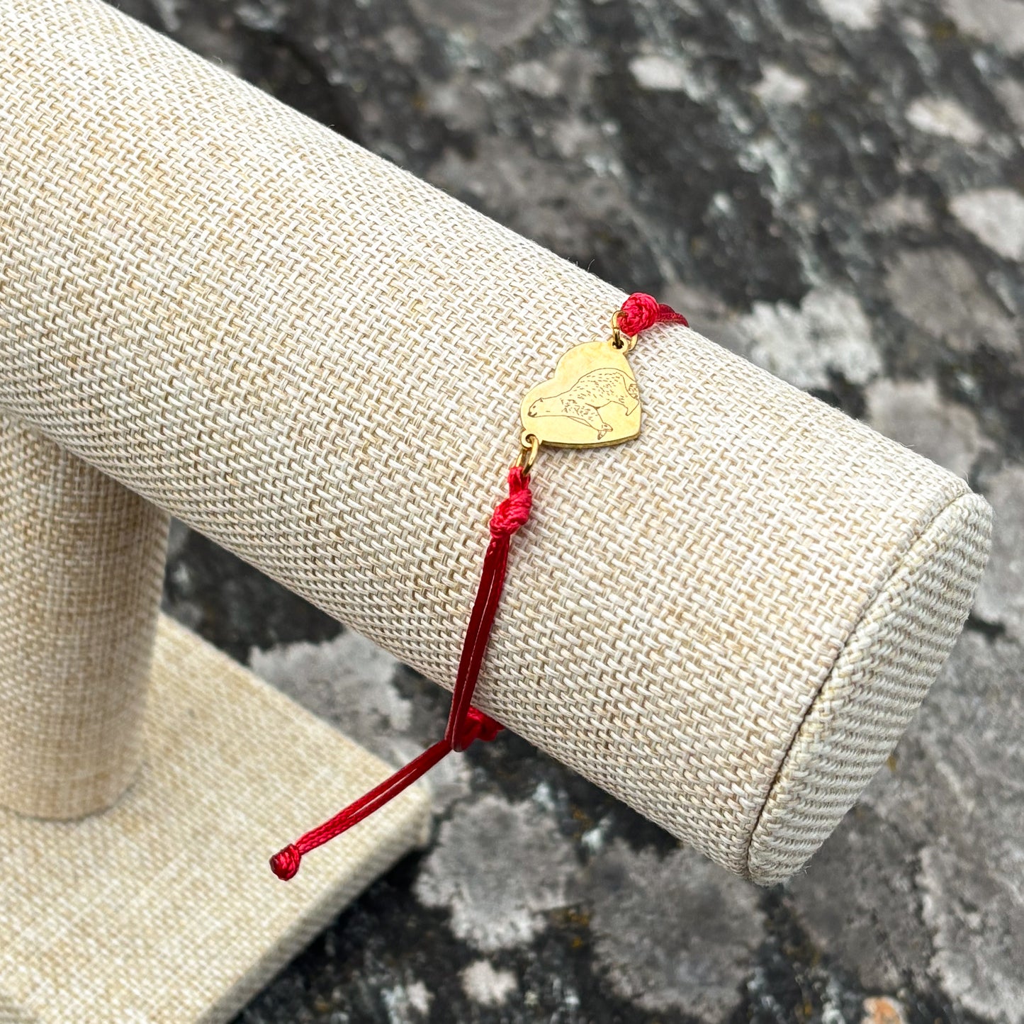 Polar bear 14x12mm heart golden on thin cord red