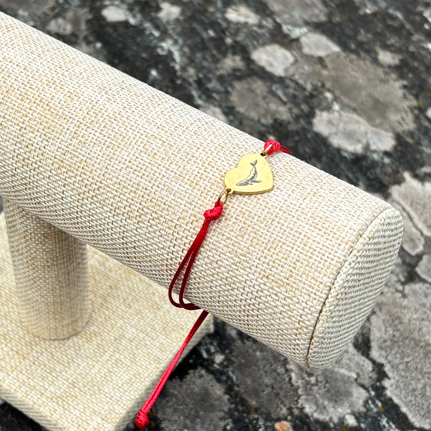 Whale on heart 14x12mm golden on thin cord red
