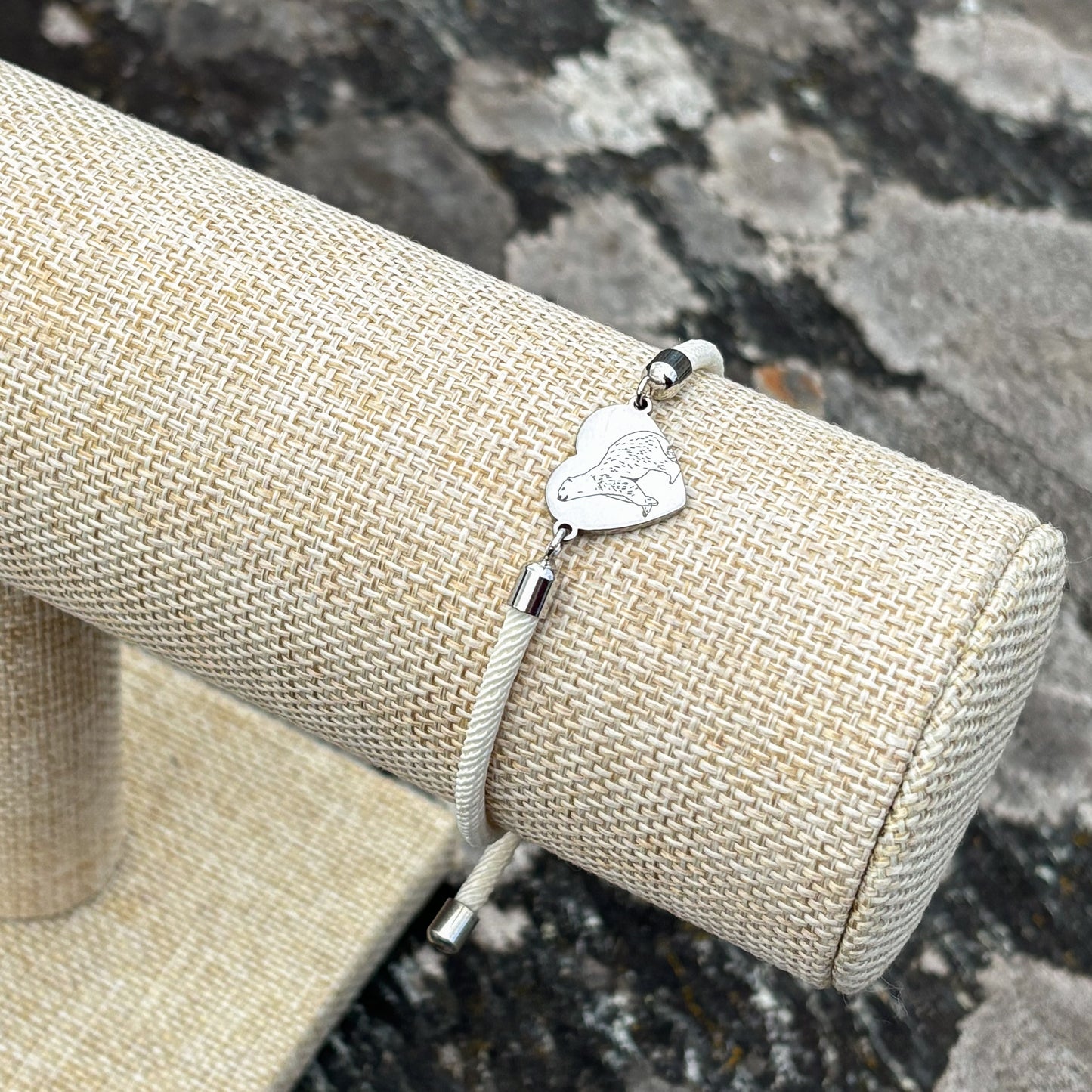 Polar bear 14x12mm heart silver on thick cord creamy white