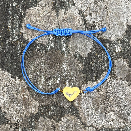 Whale on heart 14x12mm golden on thin cord blue