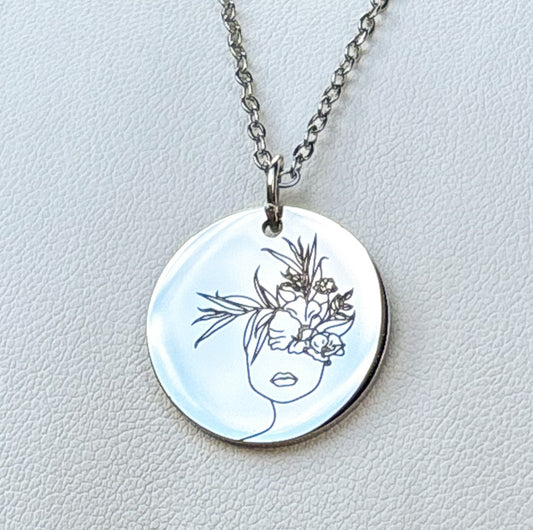 Head with flowers growing out necklace - Stainless Steel